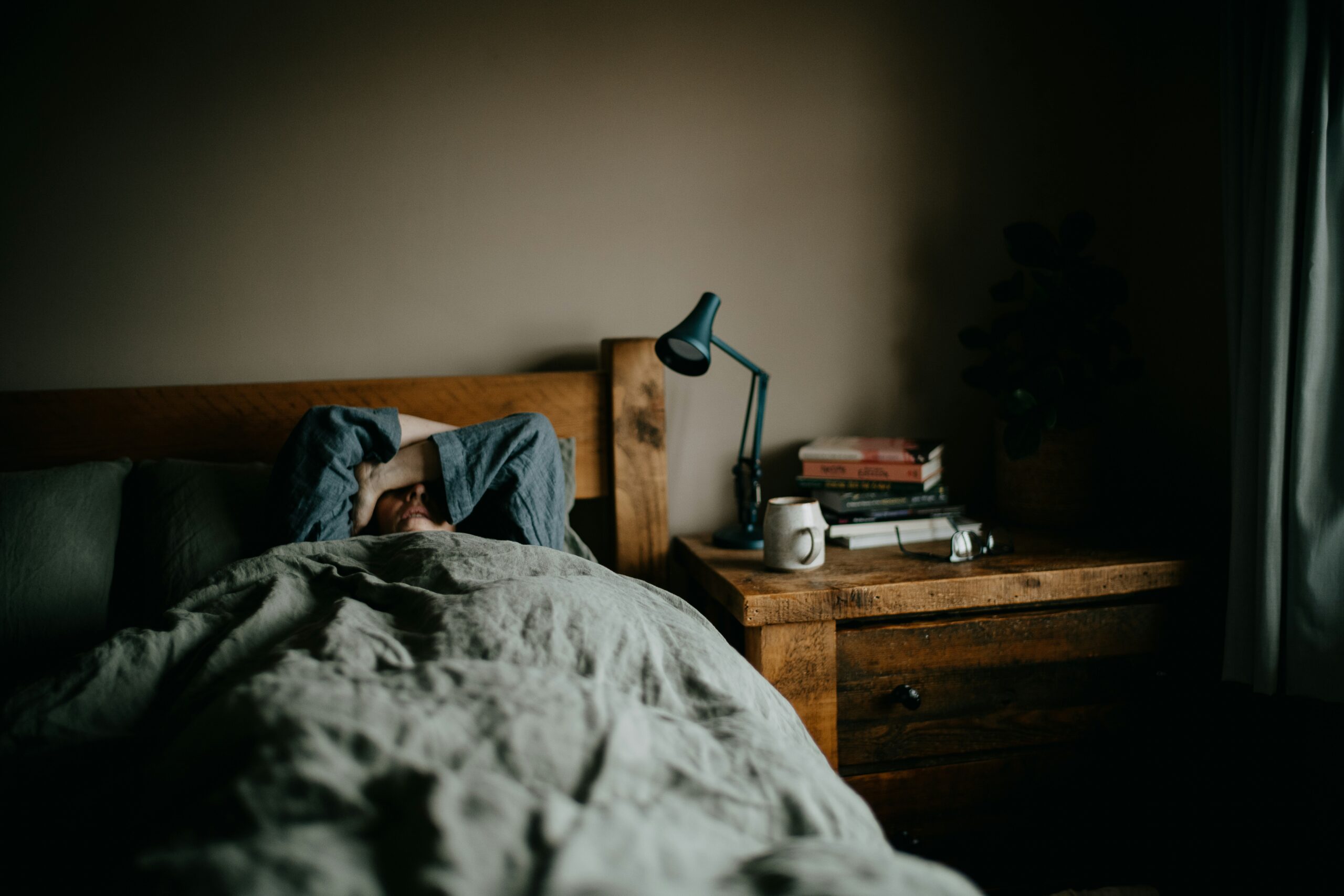 Person lying in bed